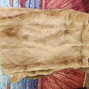 Noble excellence faux fur blanket.